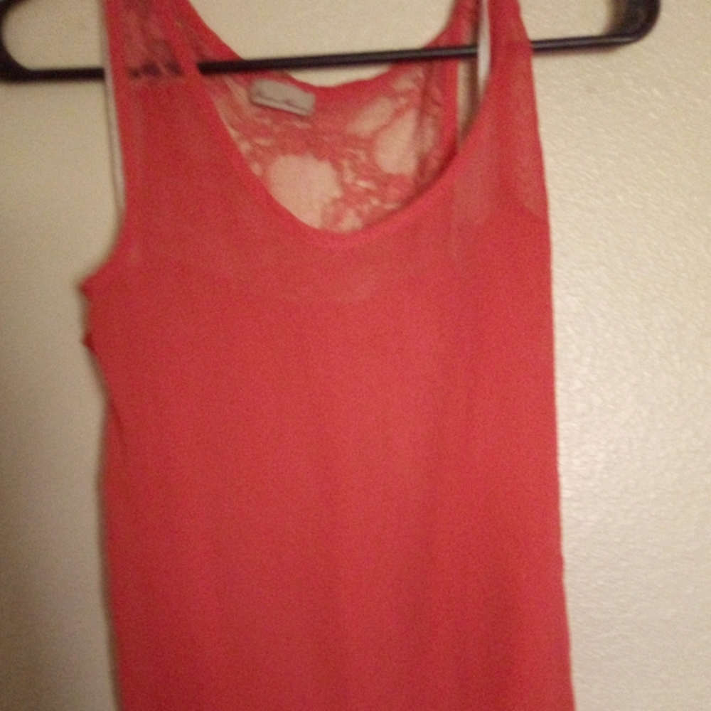 Orange blouse flower design in the back